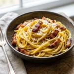 Healthy pasta carbonara dish with fresh ingredients